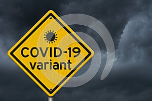 COVID-19 variant warning on a on yellow highway caution road sign