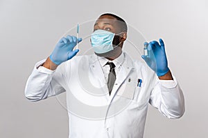 Covid19, pandemic and healthcare concept. Passionate handsome african-american doctor dedicate life treating patients