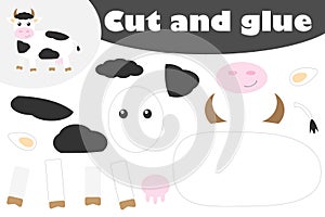 Cow in cartoon style, education game for the development of preschool children, use scissors and glue to create the applique, cut