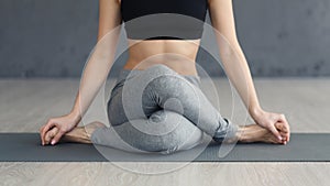 Cow Face Pose. Woman Practicing Yoga At Home