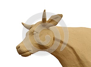 Cow head sculpture on white background