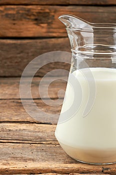 Cow milk in jug, cropped image.