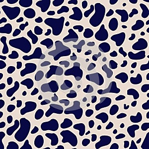 Cow seamless pattern. Freeform shapes repeated on light background