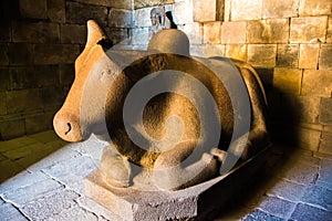 Cow statue in Ancient mystical old Hindu Prambanan temple near Yogyakarta, Java island Indonesia