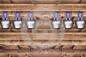 Cowbells on wooden board