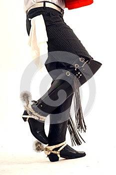 cowboy boot , spur with leather chaps gaucho close up chile