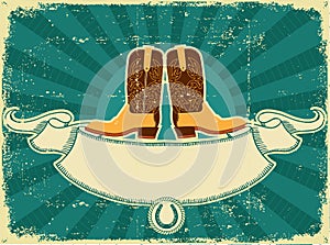 Cowboy boots card on old paper .Vintage background