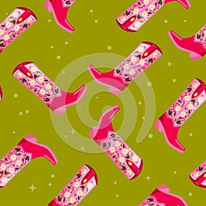 Cowboy boots with flowers and hearts on vibrant green background, seamless pattern. Cute festive repeat pattern. Bright colorful