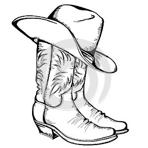 Vaquero zapatos a un sombrero 