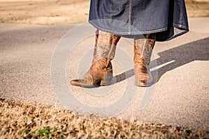 Cowboy Boots, One Boot Propped Out to Side