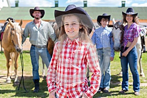 cowboy girl closeup portrait on background of her