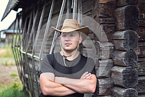 Cowboy in a hat and a black t-shirt