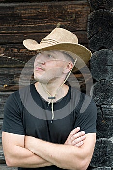 Cowboy in a hat and a black t-shirt