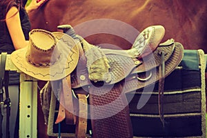 Cowboy hat, saddle, horse competition equipment