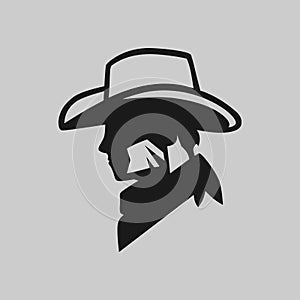 Cowboy head symbol on gray backdrop