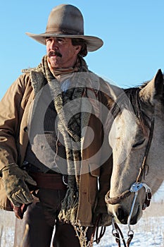 A Cowboy and His Horse photo