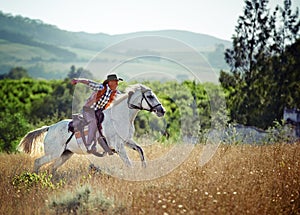 Yeeha. A cowboy on his horse.