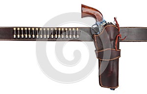 Cowboy holster with gun and bullets photo