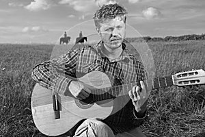 Cowboy playing guitar