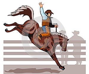 Cowboy riding a bucking bronco photo