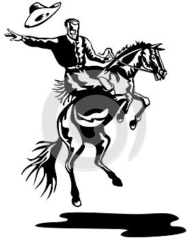 Cowboy riding a bucking bronco photo