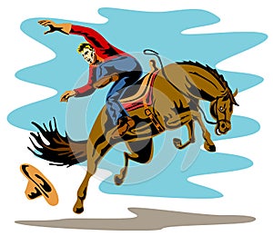 Cowboy riding a bucking bronco