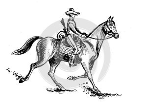 Cowboy riding a horse.