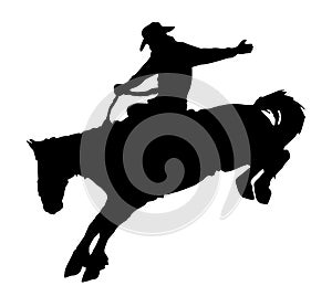 Cowboy riding horse at rodeo. photo