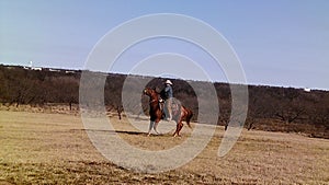 Cowboy Riding Off to Roundup Cattle