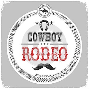 Cowboy rodeo label with cowboy decotarion isolated on white. photo