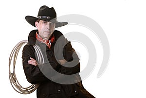 Cowboy with rope on shoulder