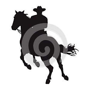 cowboy silhouette in horse jumping