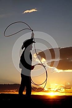 Cowboy silhouette roping