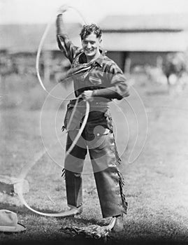 Cowboy spinning lasso photo