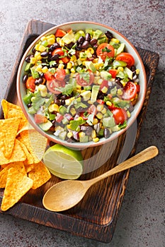Cowboy texac caviar is a traditional American salad made with black beans, garlic, onion, bell peppers, jalapenos, corn, coriander photo