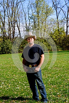 Cowboy Thumbs in Pocket in Field