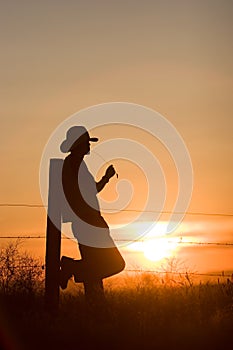 Cowboy Watching Sunset