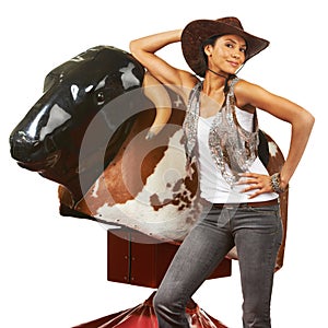 Cowboy, woman and arm on rodeo bull machine for fitness portrait with western fashion in studio mockup. Workout, model