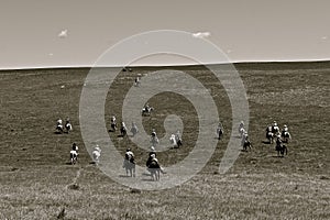 Cowboys and cowgirl headed to a roundup