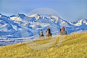 Cowboys on the range mountain background photo