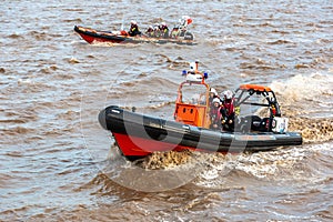 Cowes Lifeboat in action in Hull in a sunny day, Kingston upon Hull, UK