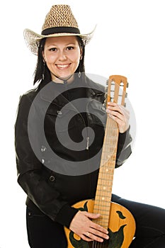 Cowgirl in ahat with acoustic guitar