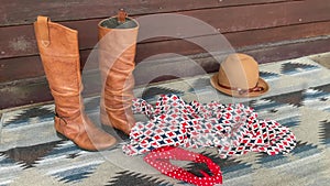 Cowgirl boots and women`s clothing Take off one garment at a time cowboy