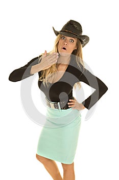 Cowgirl in green skirt surprised