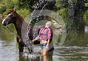 Cowgirl with the horse