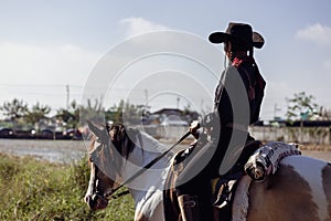 Cowgirl Horseback Riding, Woman on Horse at Sunset