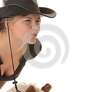 Cowgirl (jockey) race on hobbyhorse