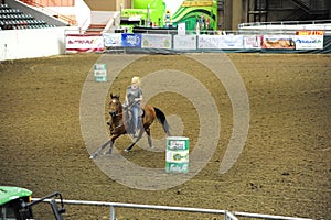 A cowgirl practices inside the Tunica Arena and Exposition Center, Tunica Mississippi.