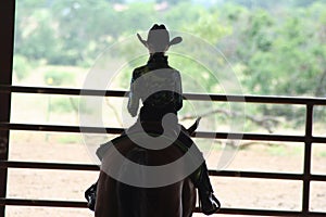 Cowgirl riding at horse show