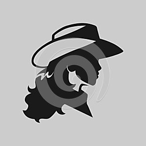 Cowgirl symbol on gray backdrop